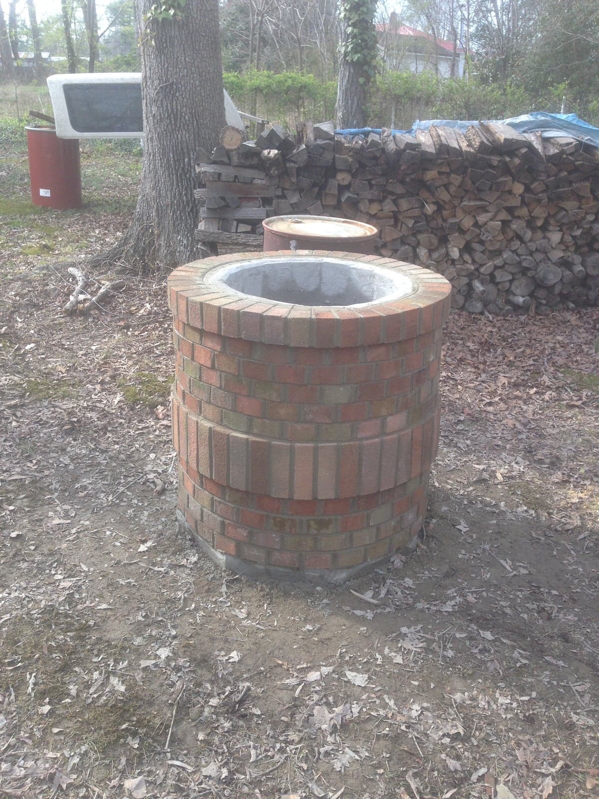 Round freestanding brick fire pit